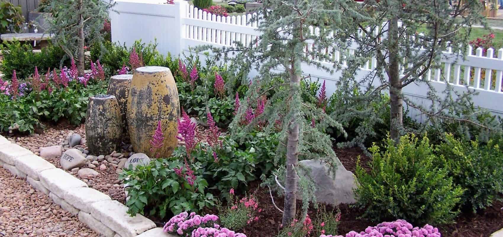 Outdoor decor in landscape bed