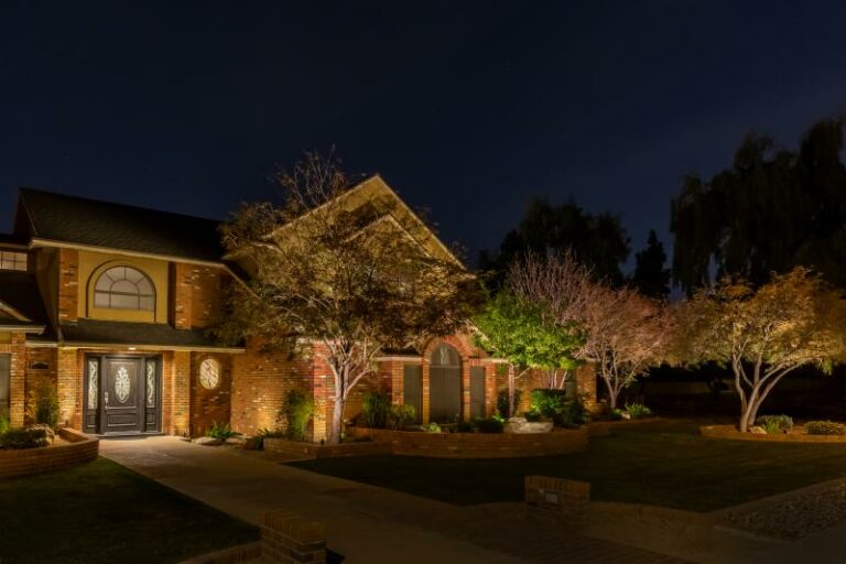 Colored dimmable outdoor LEDS shine on a home in Springfield, MO